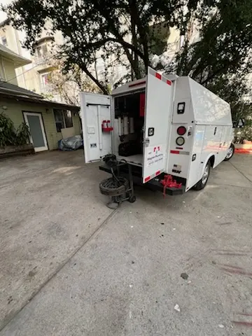 Magnet Plumbing service vehicle on-site for Grease Trap Cleaning in Lakeside Estates